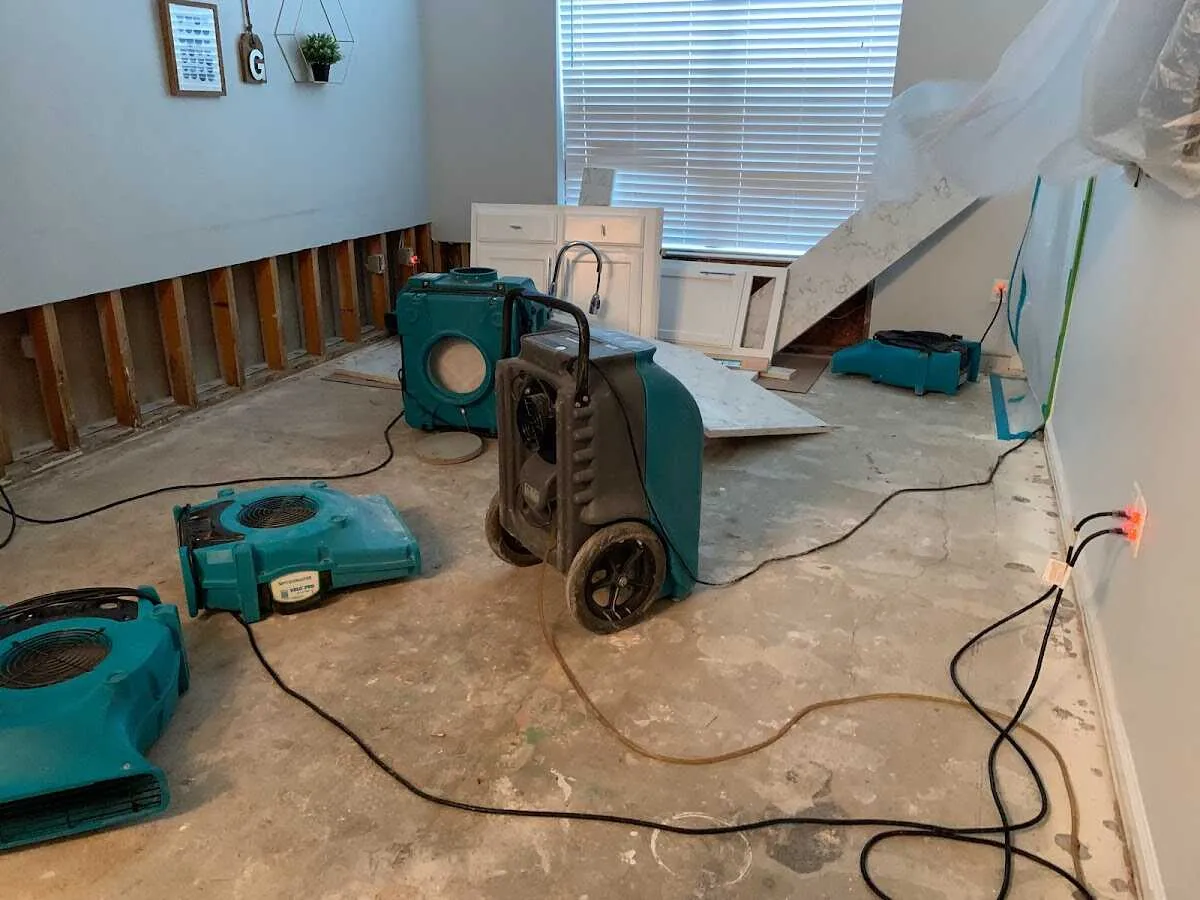Dehumidifier in flood-cut room for Water Damage Restoration in Marlboro Village